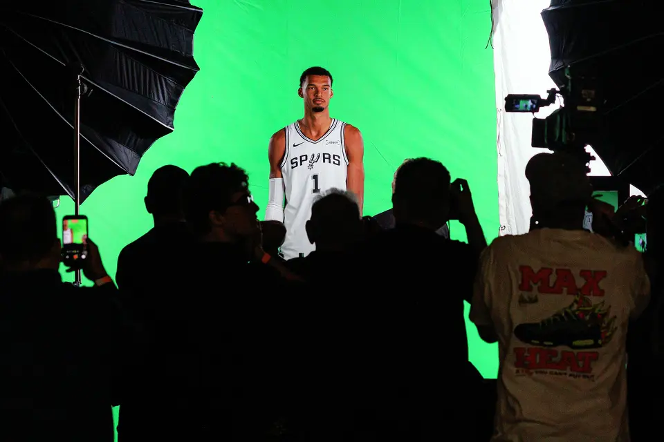 San Antonio Spurs center Victor Wembanyama poses for photos and video clips during the NBA basketball team’s media day at the Victory Capital Performance Center in San Antonio, Monday, Sept. 28, 2026.