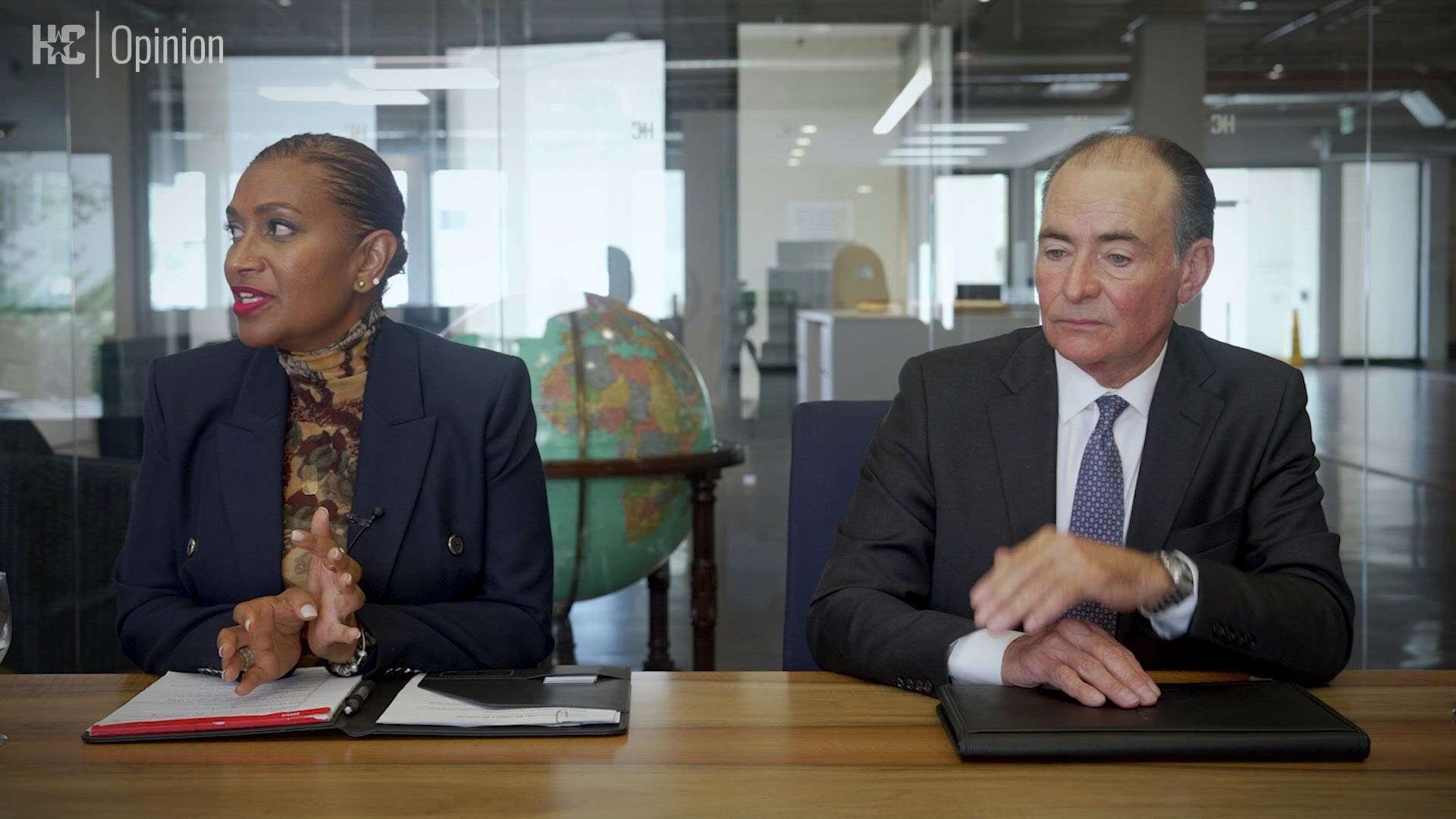 Letitia Plummer (left) and Orlando Sanchez sit for a screening with the Houston Chronicle editorial board.