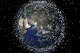 A computer-generated impression released by the European Space Agency depicts an approximation of 12 000 objects in orbit around the Earth.