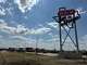 A giant H-E-B sign towers over I-35 in San Marcos on September 28, 2026, ahead of the store’s October 7 opening.