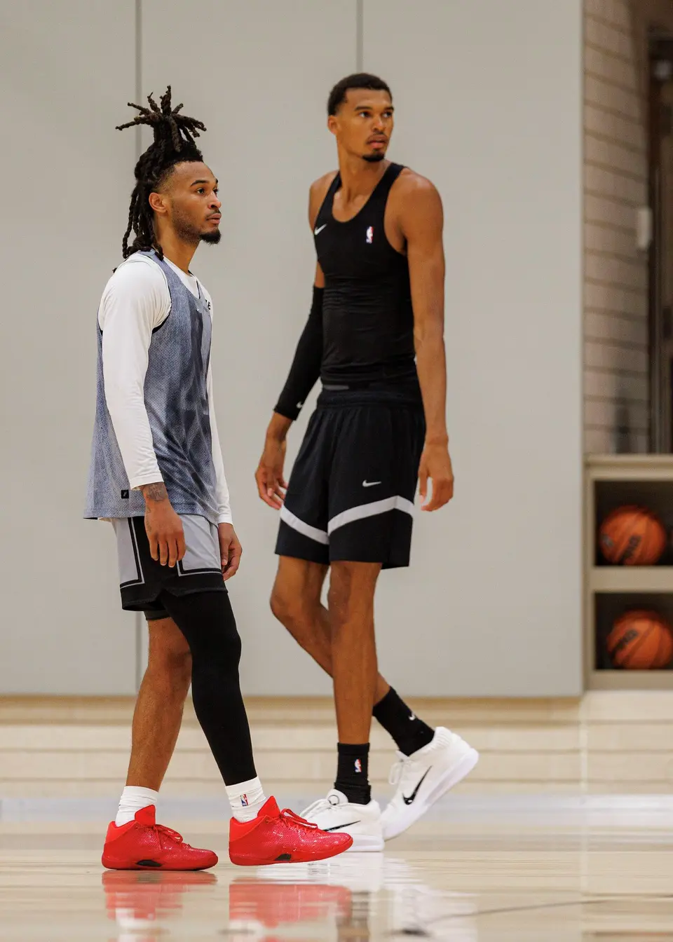 San Antonio Spurs’ Stephon Castle and Victor Wembanyama participate in training camp at Victory Capital Performance Center in San Antonio, Tuesday, Sept. 29, 2026.
