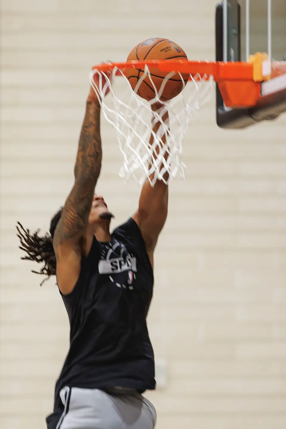 San Antonio Spurs guard Devin Vassell dunks the ball during training camp at Victory Capital Performance Center in San Antonio, Tuesday, Sept. 29, 2026.