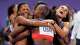 FILE - The United States' women 4x400-meter relay team celebrates winning the gold medal at the 2024 Summer Olympics, Aug. 10, 2024, in Saint-Denis, France.
