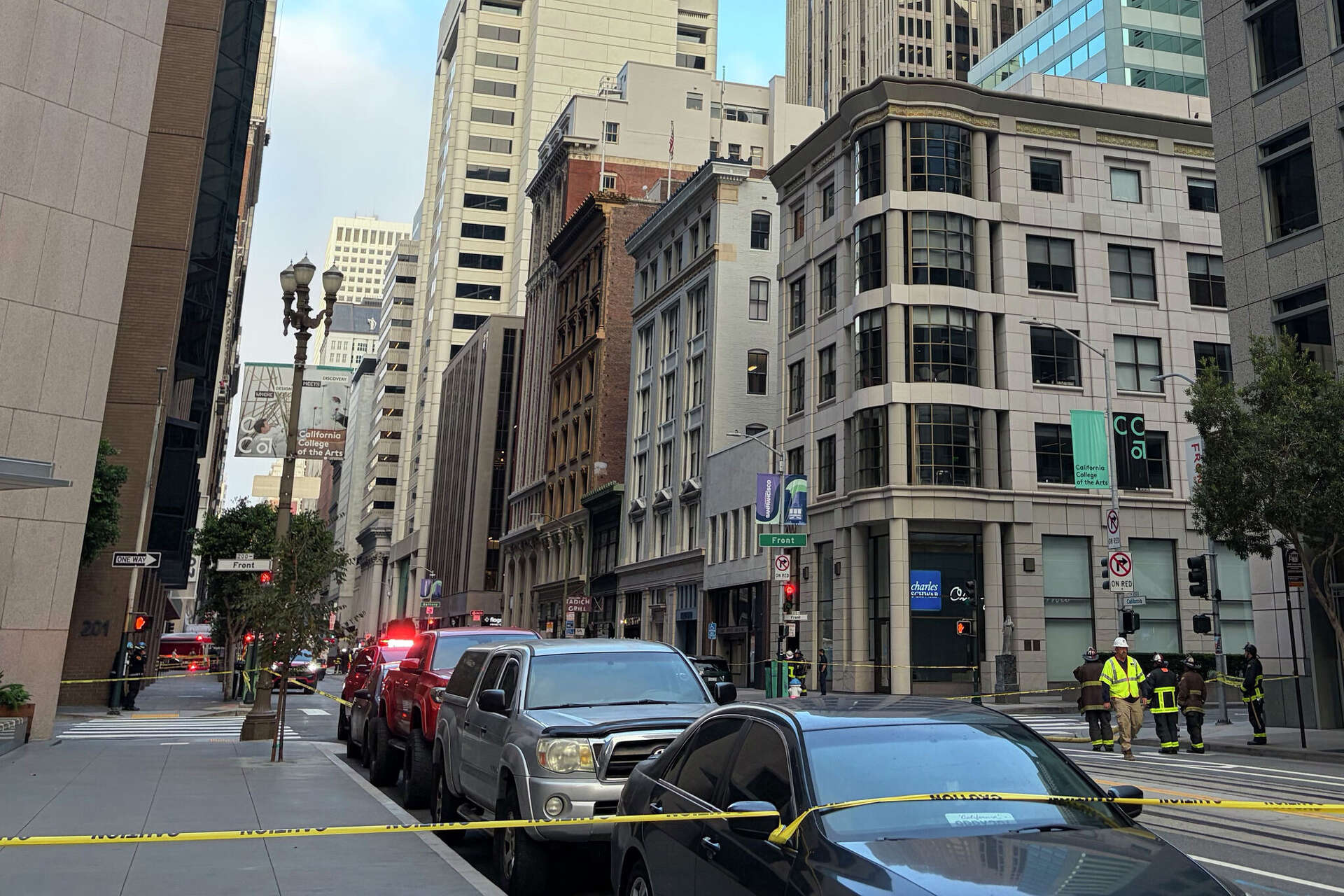 The block surrounded by Front, California, Sacramento and Davis streets has been cordoned off as San Francisco firefighters battle an underground electrical bla