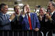 U.S. Sen. Ted Cruz (R-TX) (L) applauds as Republican Senate candidate Texas Attorney General Ken Paxton (C) waves while U.S. President Donald Trump speaks during a visit to the Peterbilt Motors truck plant on October 01, 2026, in Denton, Texas. (Photo by Kevin Dietsch/Getty Images)