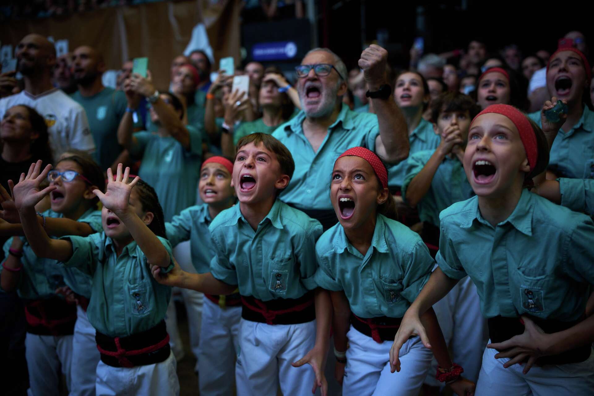 Photos show colorful teams building human towers in Spain’s Catalonia