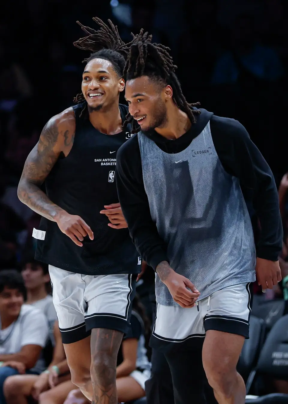 Spurs’ Devin Vassell and Stephon Castle run down the court while competing against each other in the Silver & Black Scrimmage at Frost Bank Center in San Antonio, Sunday, Oct. 4, 2026.