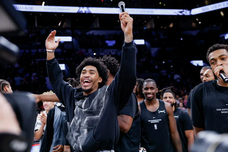 San Antonio Spurs Spurs’ Dylan Harper cheers with the crowd after watching the rookies perform karaoke at the Silver & Black Scrimmage at Frost Bank Center in San Antonio, Sunday, Oct. 4, 2026.