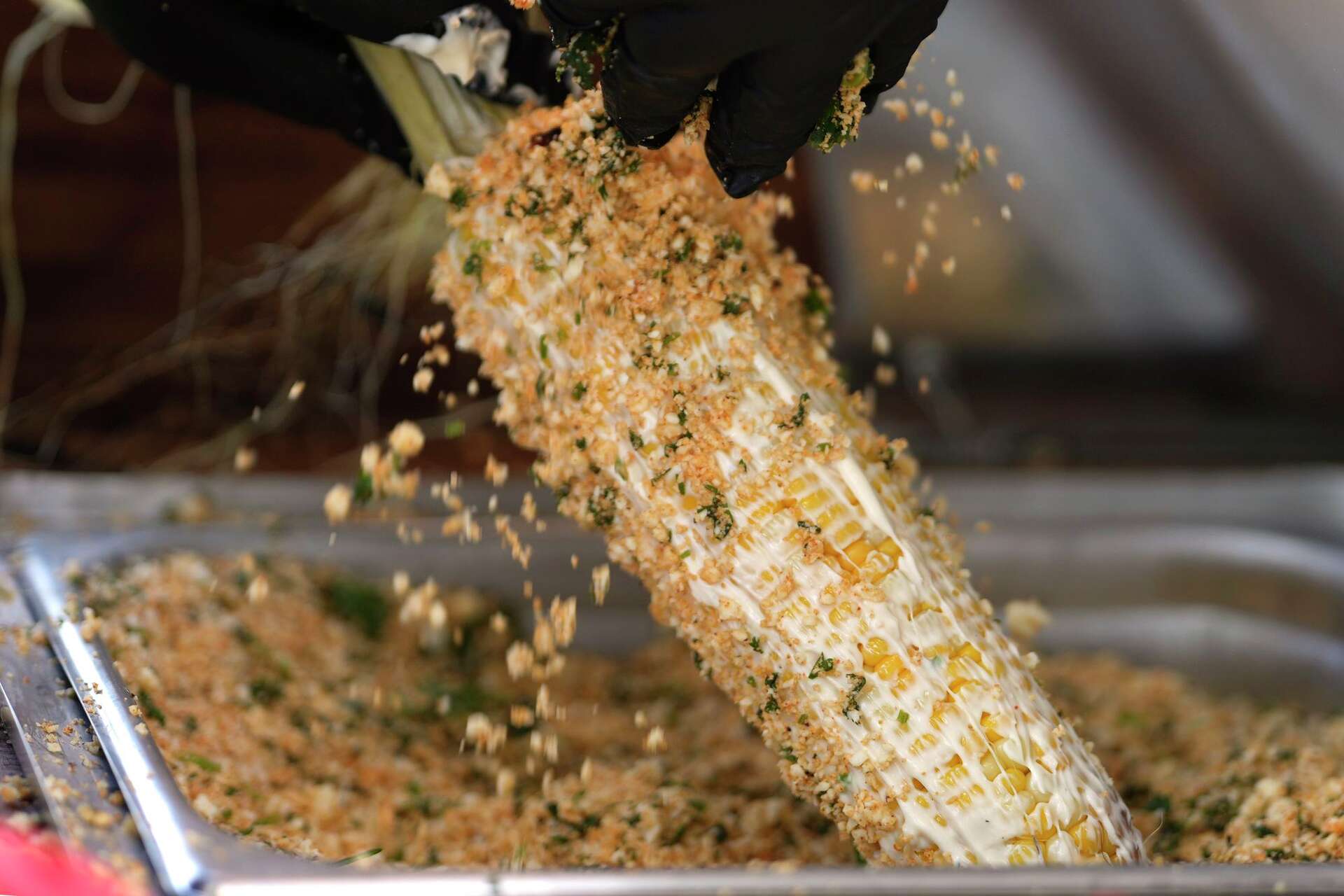 Fire Roasted Elotes is prepared during a media tour at the Texas Renaissance Festival in Todd Mission on Thursday, Oct. 8, 2026.