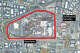A satellite view of the Tesla factory next to Lila Bringhurst Elementary in Fremont, Calif.