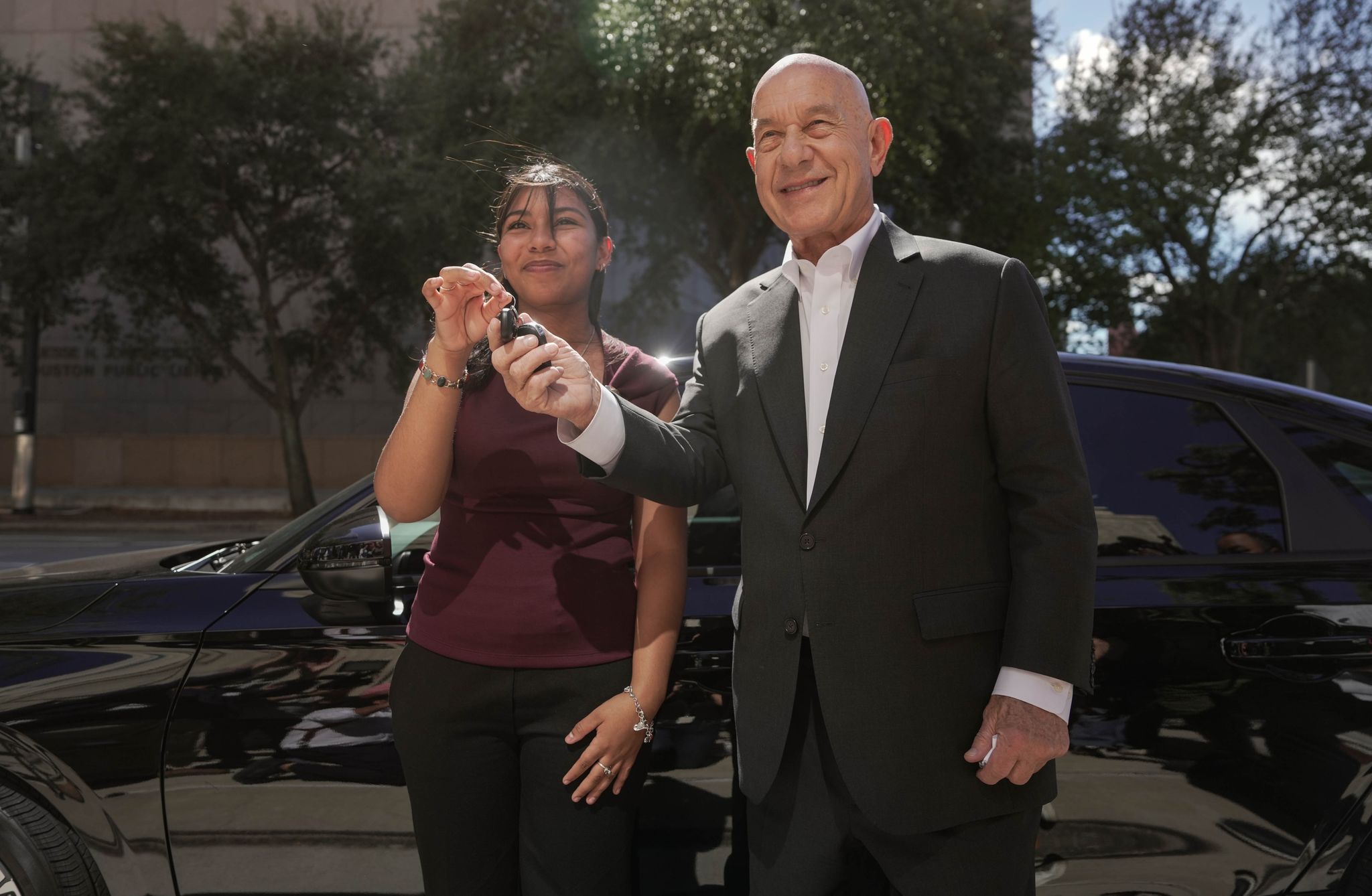 Mayor Whitmire presents new car to UH student whose vehicle was shot by HPD