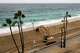 Rachel saves major flooding in Southern California 2 An excavator reinforces a sand berm near the Balboa Pier in Newport Beach on Sunday as Southern California assesses damage from post-tropical storm Rachel.