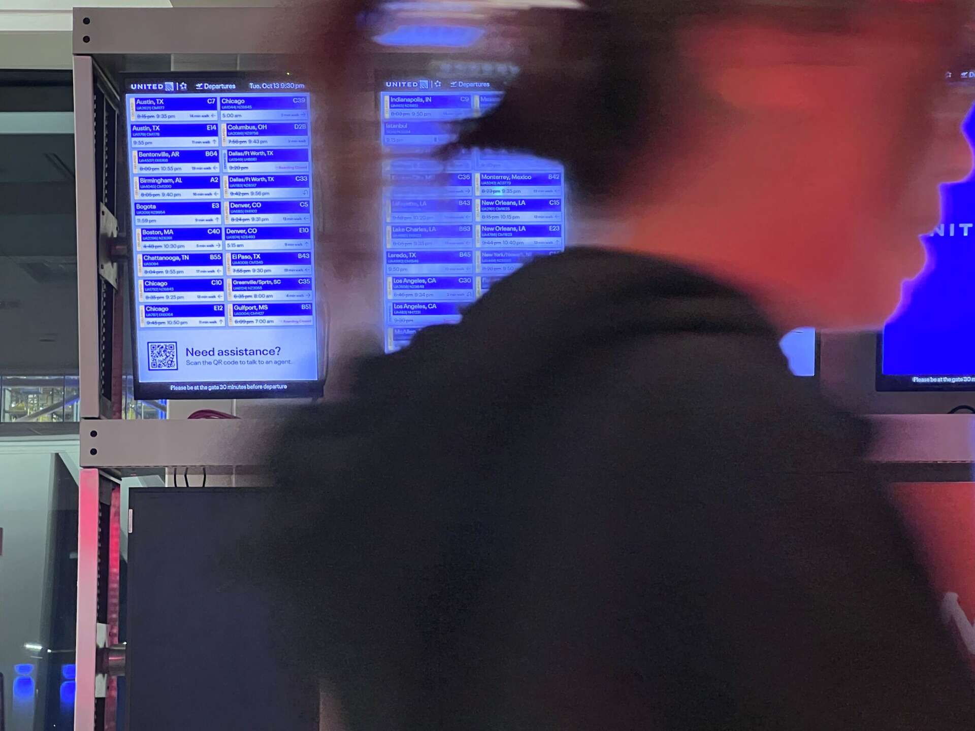 Displays at IAH showing flight delays on Tuesday, Oct. 13, 2026.