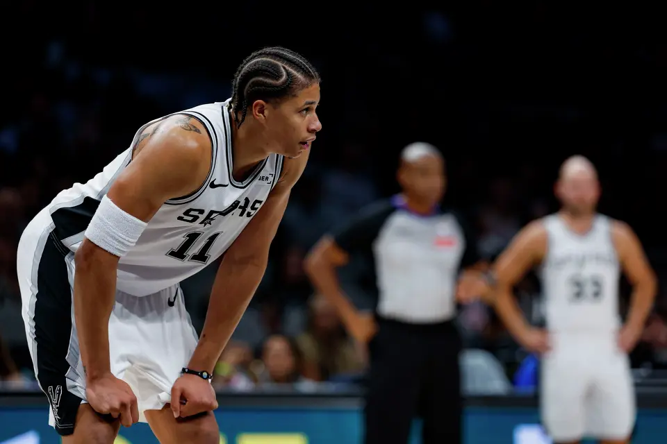 San Antonio Spurs forward Carter Bryant (11) plays in the second half of a preseason NBA game against the Phoenix Suns at Frost Bank Center in San Antonio, Wednesday, Oct. 14, 2026. The Spurs defeated the Suns 123-103.