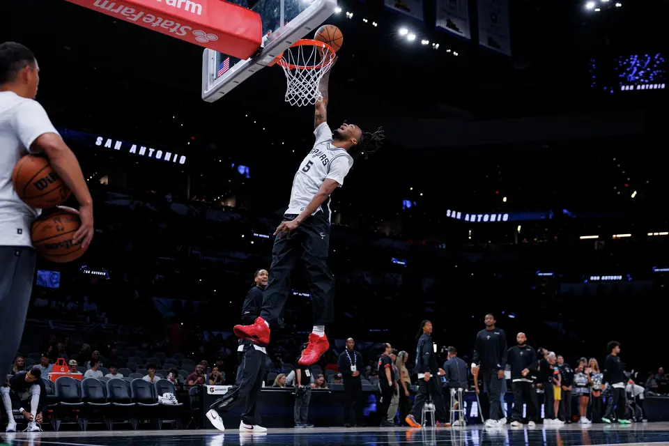 San Antonio Spurs guard Stephon Castle (5) warms up before taking on the Phoenix Suns in a preseason NBA game at Frost Bank Center in San Antonio, Wednesday, Oct. 14, 2026.