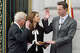 Gavin Newsom takes the oath of Office of Mayor from his father Judge William Newsom as his wife Kimberly Guilfoyle Newsom holds the Bible, Jan. 8, 2004.