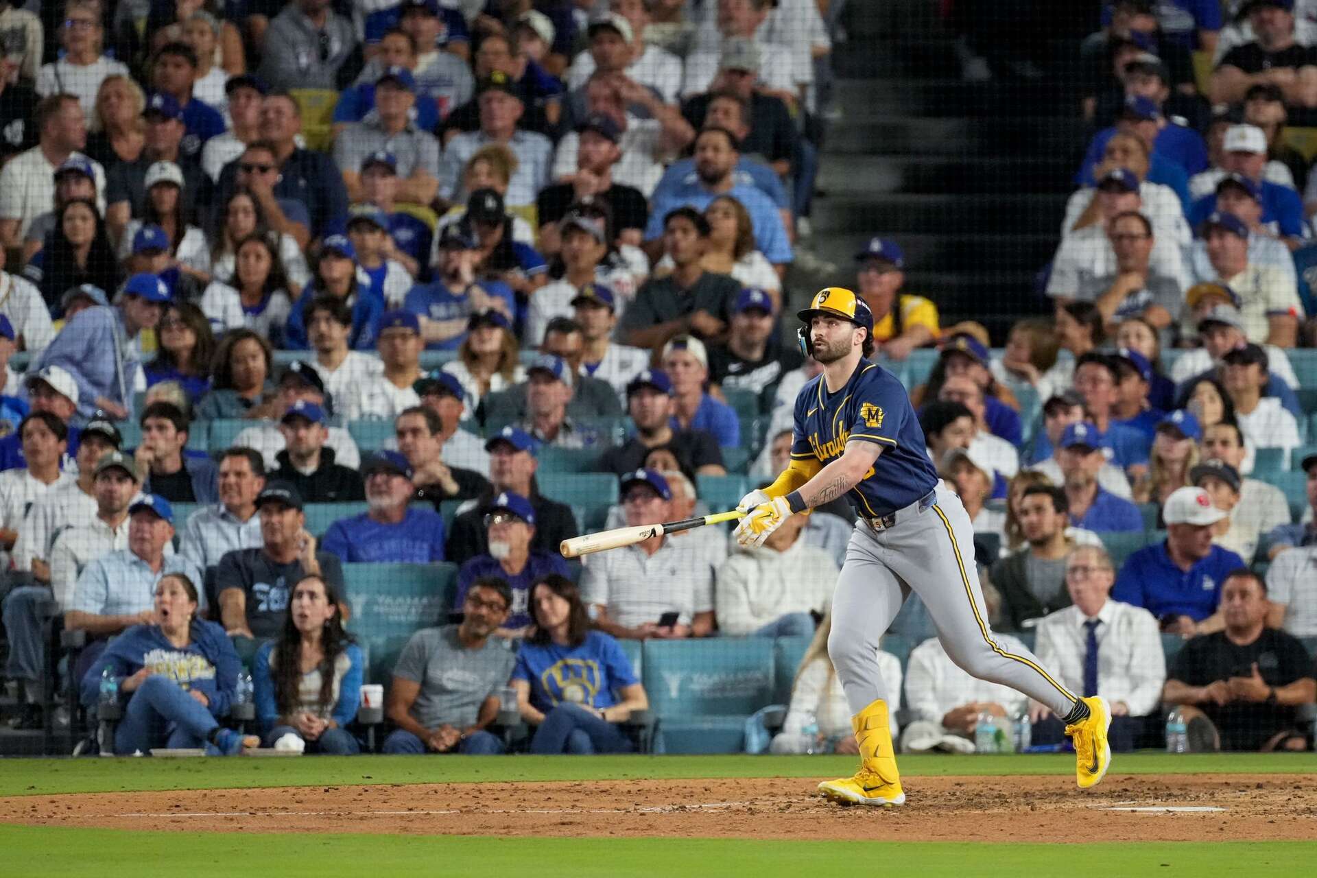 Milwaukee Brewers center fielder Garrett Mitchell follows through on his solo home run during the sixth inning of Game 4 of baseball's National League Champions