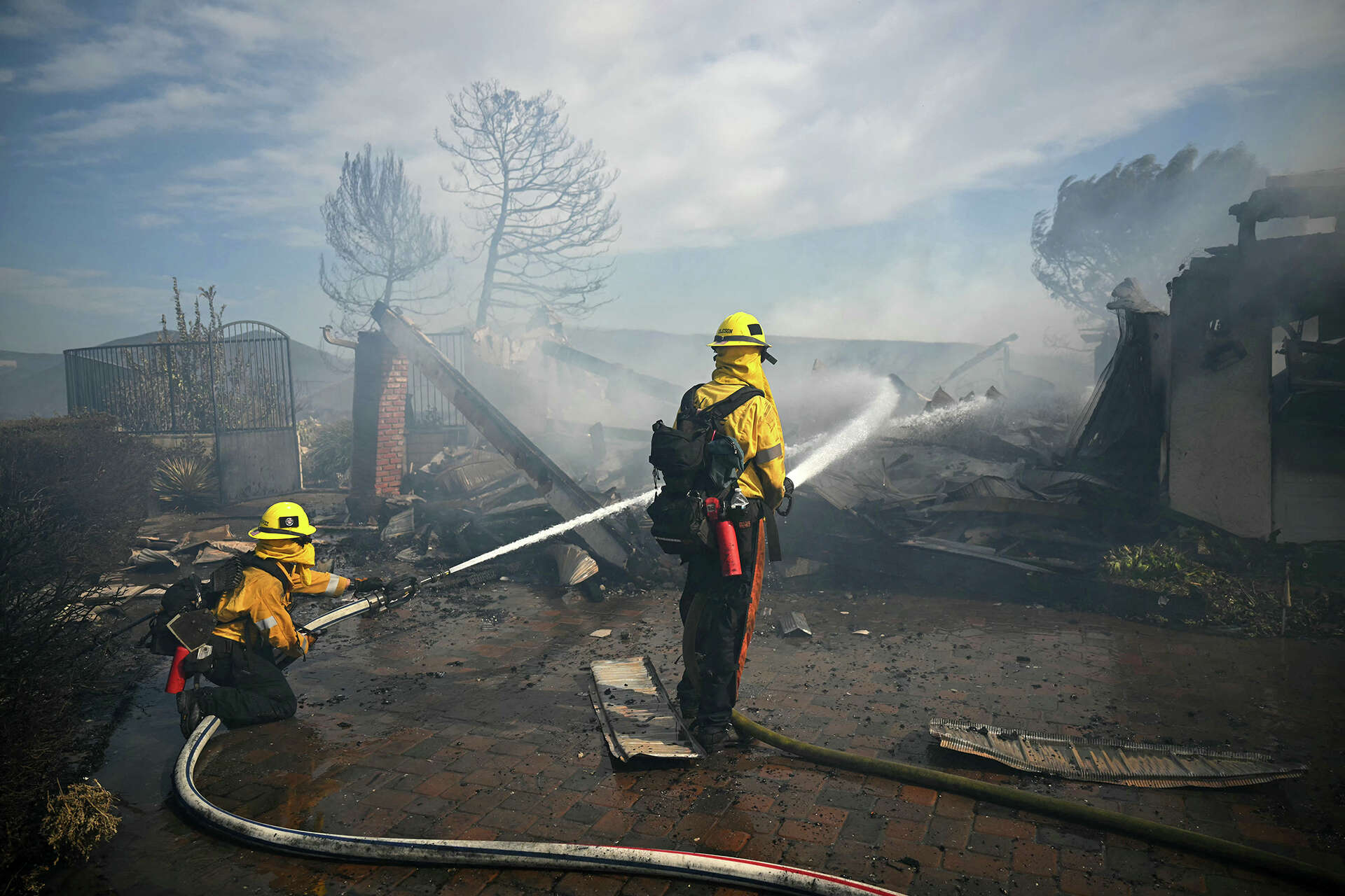 Firefighters battle the Norte Fire in San Juan Capistrano, Calif., on Oct. 16, 2026.