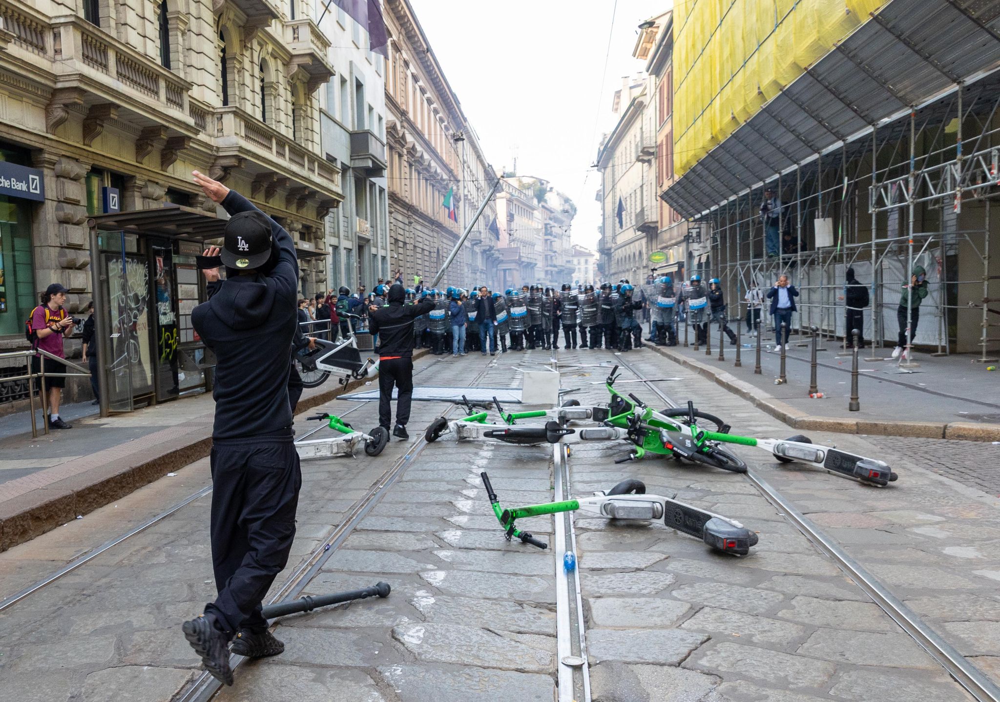 Rioters loot stores, set fires in central Milan during cost-of-living ...