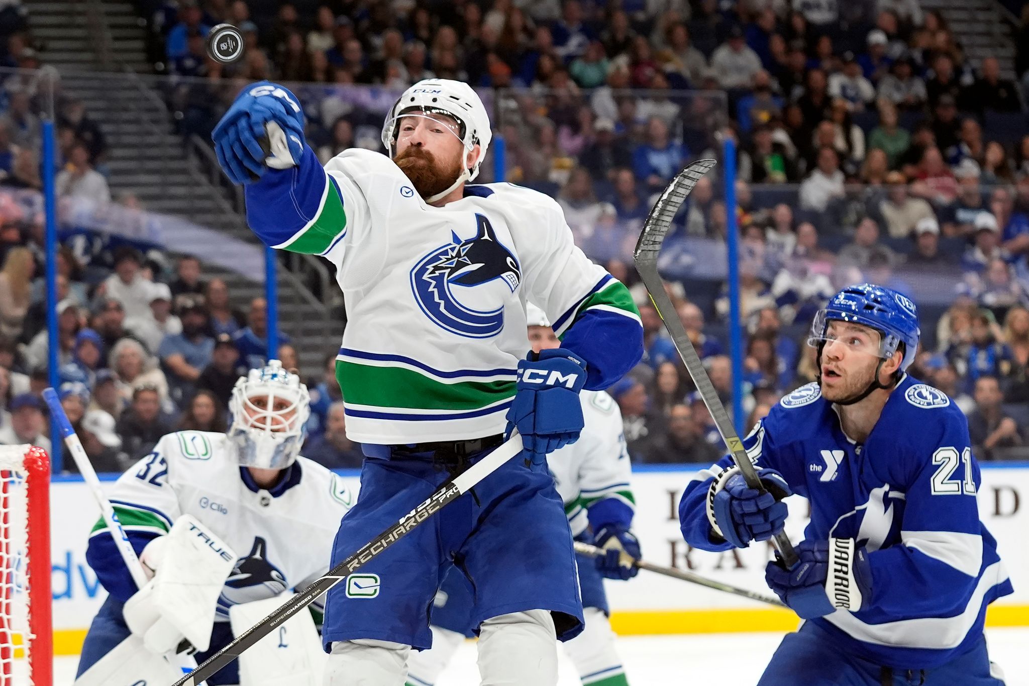 Lightning storm back from 2-goal deficit to beat the Canucks 4-2 By ERIK ERLENDSSON , Associated Press Oct 17, 2026