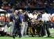 Emergency personnel tend to a service member who fell from the rafters of the Alamodome while participating in a rappelling demonstration before the UTSA-Navy football game Saturday, Oct. 17, 2026.