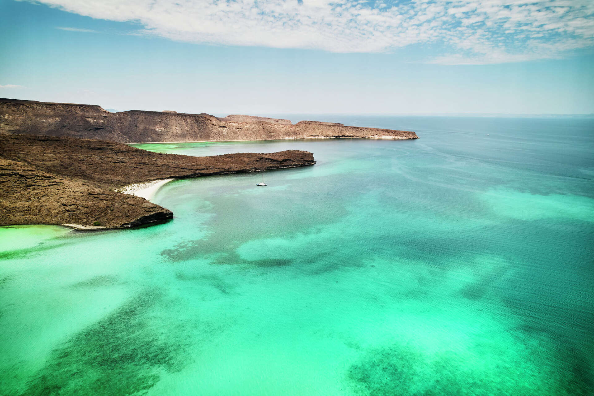 FILE: A sailboat anchored in empty bay during a cruise in Sea of Cortez.