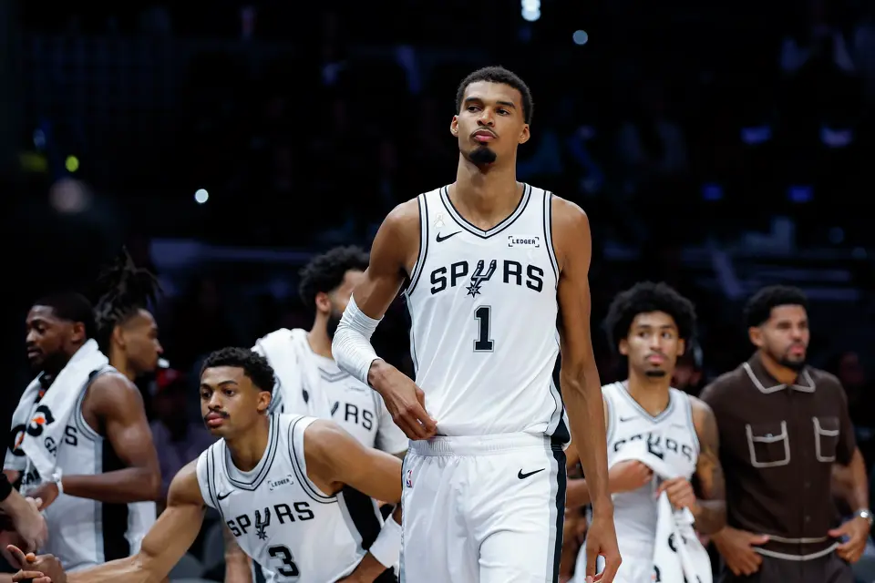 San Antonio Spurs forward Victor Wembanyama (1) and his teammates leave the court after a 116-104 loss to the Oklahoma City Thunder in the NBA season opener Tuesday, Oct. 20, 2026, in San Antonio.