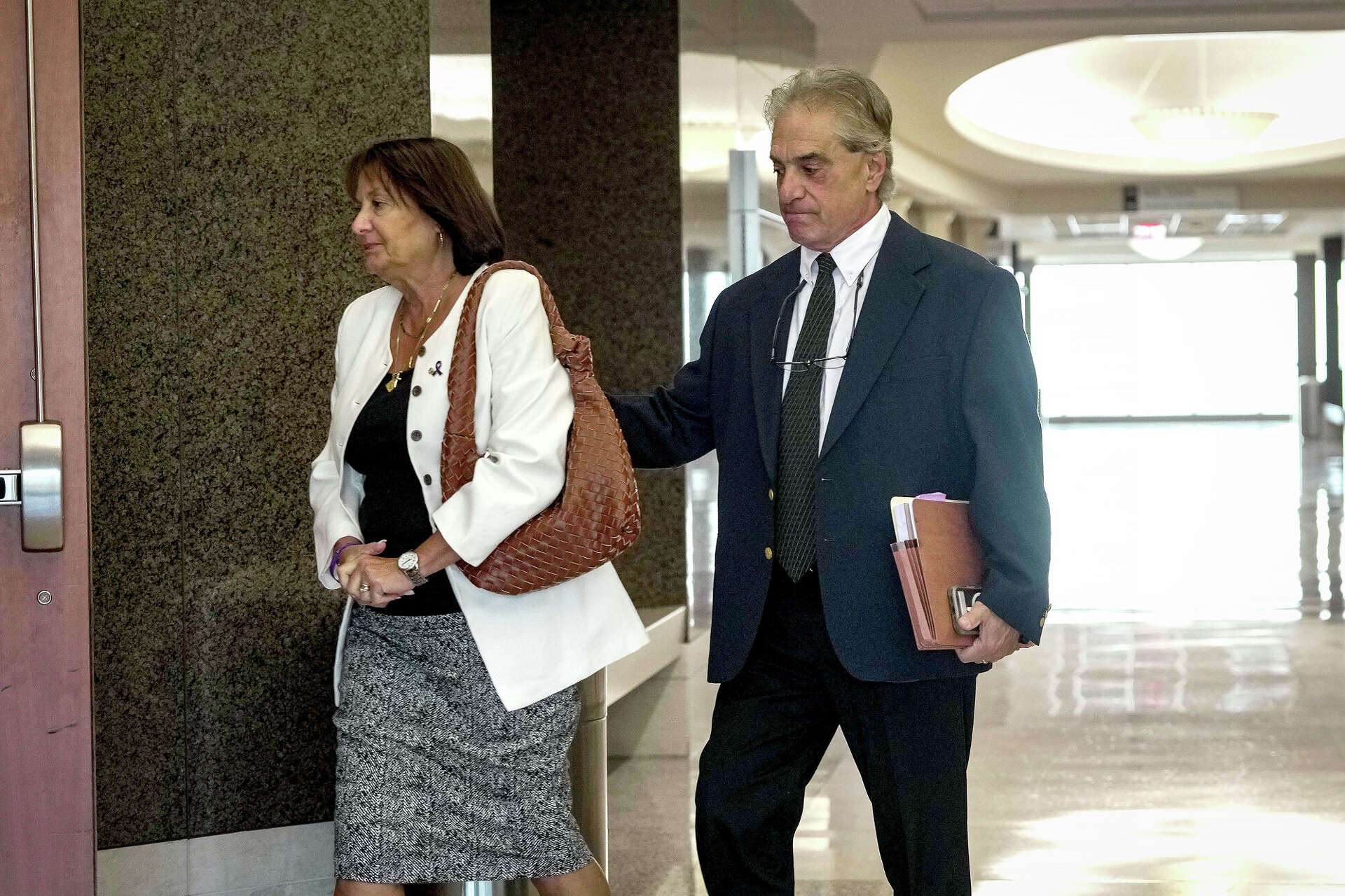 Chris Bauer and Sharon Bauer, parents of the late Christa Gilley and the maternal grandparents seeking conservatorship of her two children, arrive for the child