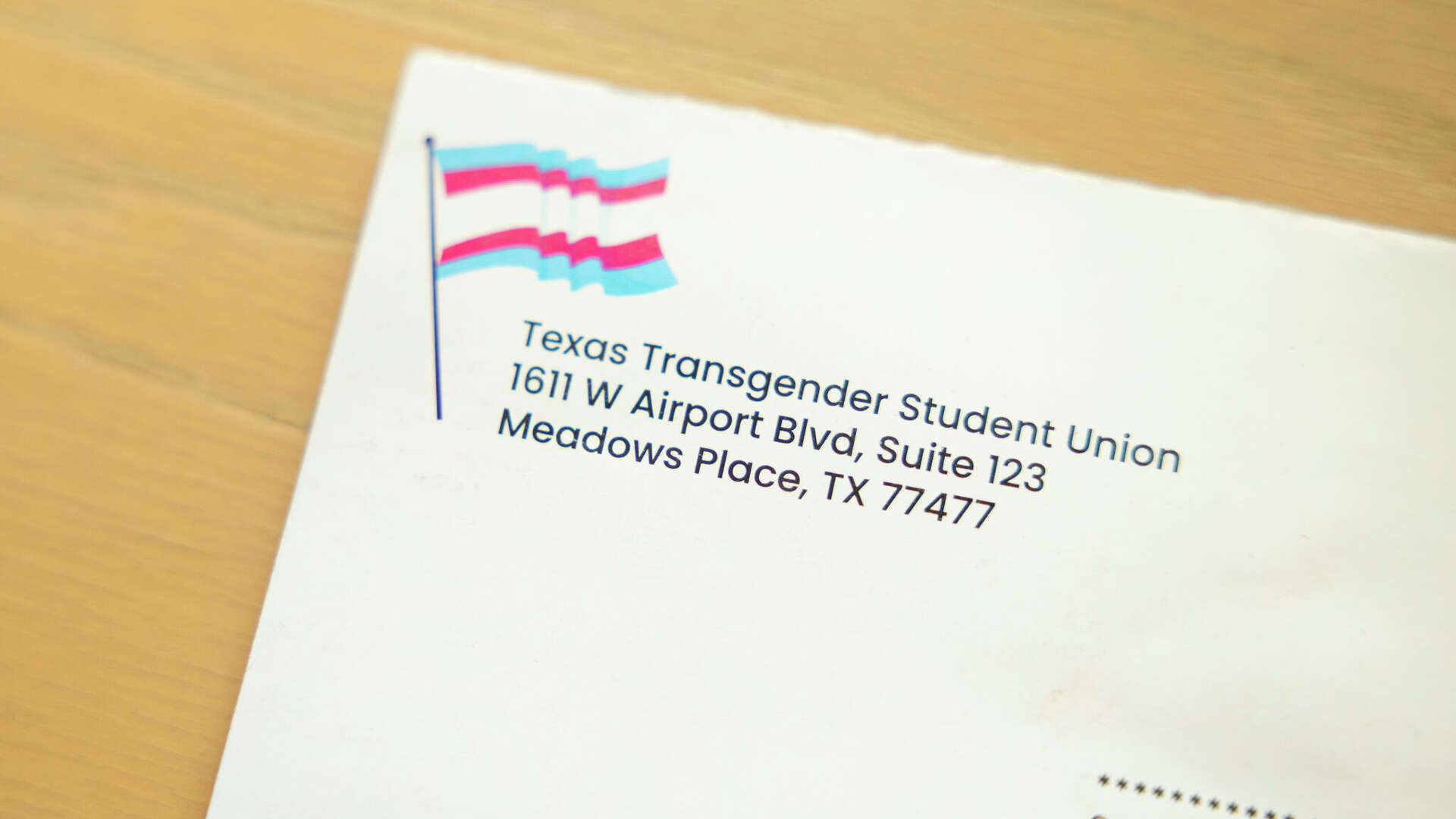 A mailer sent to Texas households purporting to be from a transgender advocacy group photographed at the Dallas Morning News in Dallas, Wednesday, Oct. 21, 2026