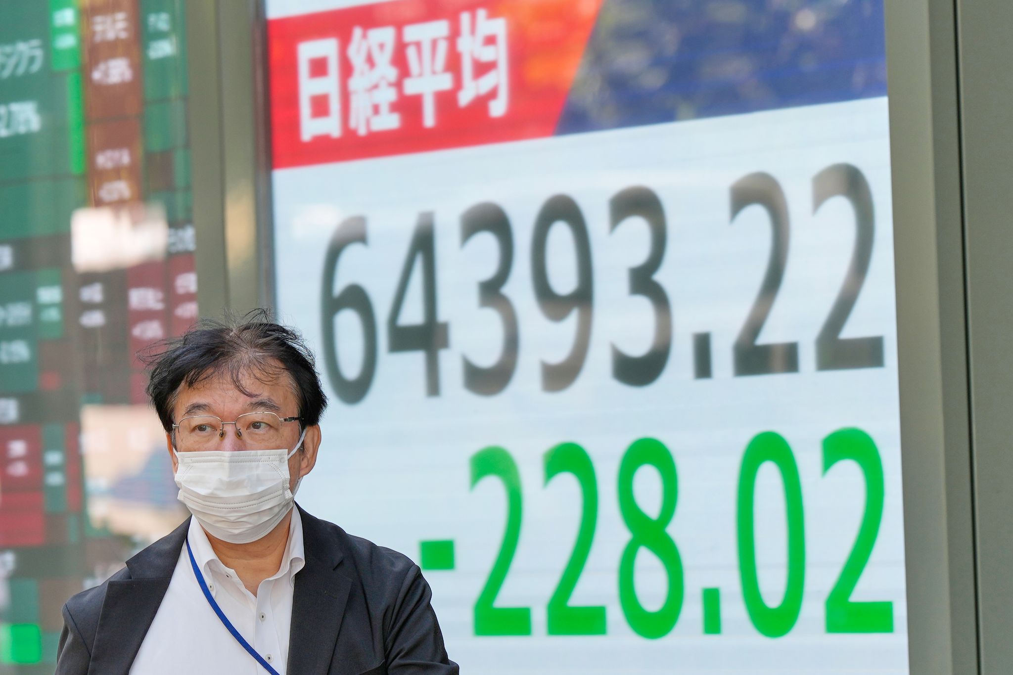 Asian shares retreat after strong profits lead a rally on Wall Street