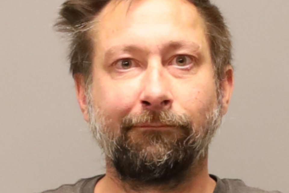 Following the dispute at the vet, police say they found “multiple firearms, ammunition and explosives” at his home.