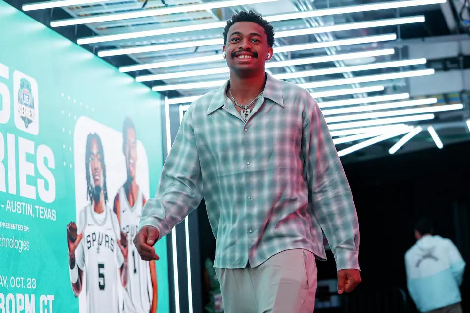 San Antonio Spurs forward Keldon Johnson walks into the Moody Center in Austin, Friday, Oct. 23, 2026, before an NBA game against the Houston Rockets.