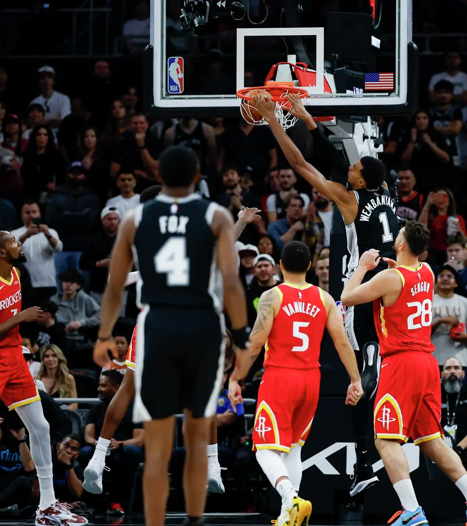 San Antonio Spurs forward Victor Wembanyama (1) dunks on the Houston Rockets during the first quarter at Moody Center in Austin, Friday, Oct. 23, 2026.