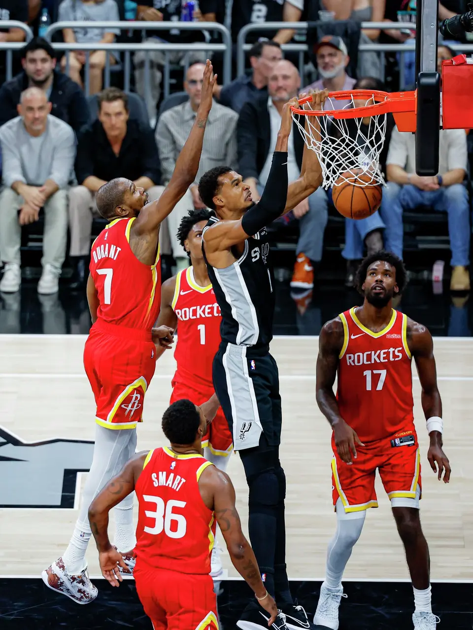 San Antonio Spurs forward Victor Wembanyama (1) dunks on the Houston Rockets during the third quarter at Moody Center in Austin, Friday, Oct. 23, 2026. The Spurs fell 114-110 to the Rockets.