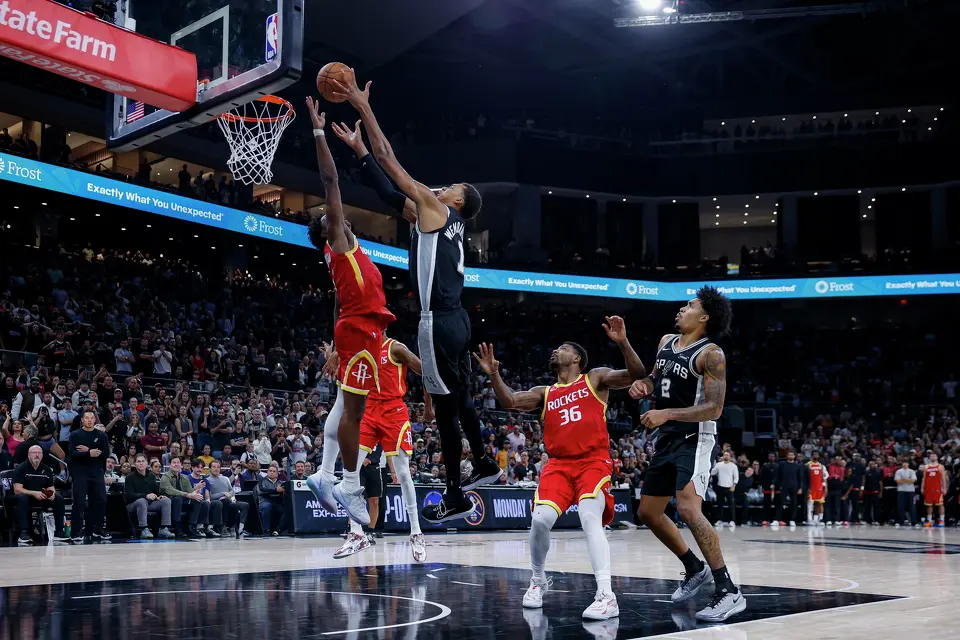 Houston Rockets guard Amen Thompson (1) blocks a shot by San Antonio Spurs forward Victor Wembanyama (1) to secure a 114-110 victory during an NBA game at the Moody Center in Austin, Texas, Friday, Oct. 23, 2026.