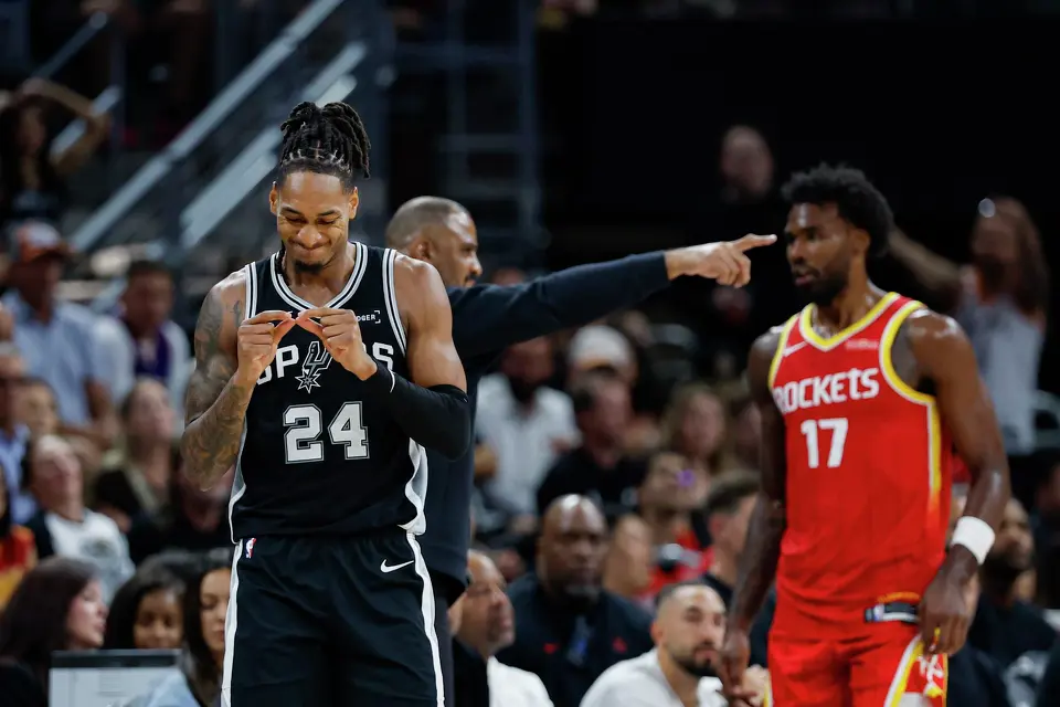 San Antonio Spurs guard Devin Vassell (24) reacts after nearly saving the ball from going out of bounds during the fourth quarter against the Houston Rockets at the Moody Center in Austin, Texas, Friday, Oct. 23, 2026. The Rockets won 114-110.