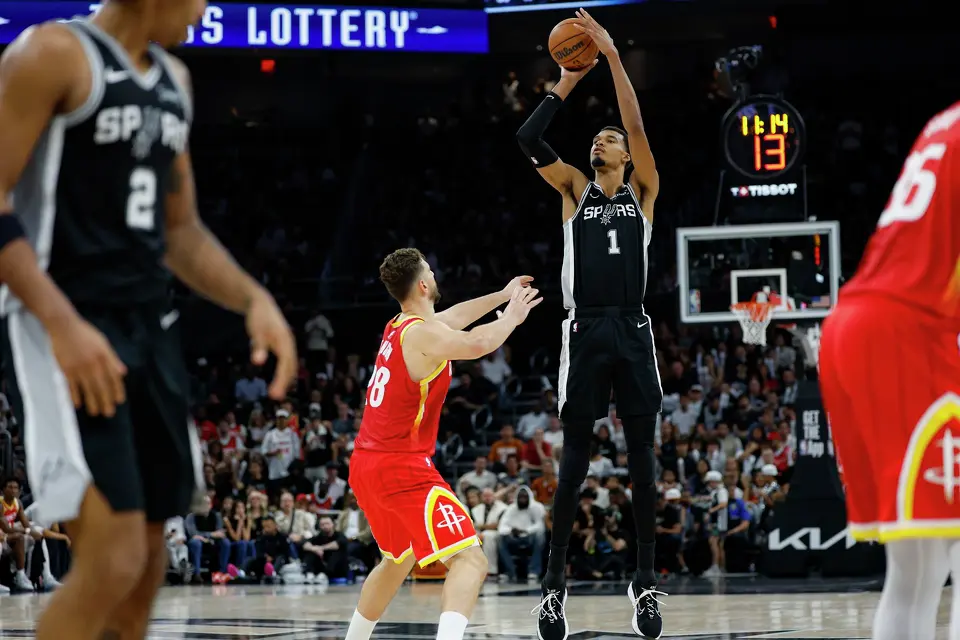 San Antonio Spurs forward Victor Wembanyama (1) shoots over Houston Rockets center Alperen Sengun (28) during the fourth quarter at Moody Center in Austin, Friday, Oct. 23, 2026. The Spurs fell 114-110 to the Rockets.