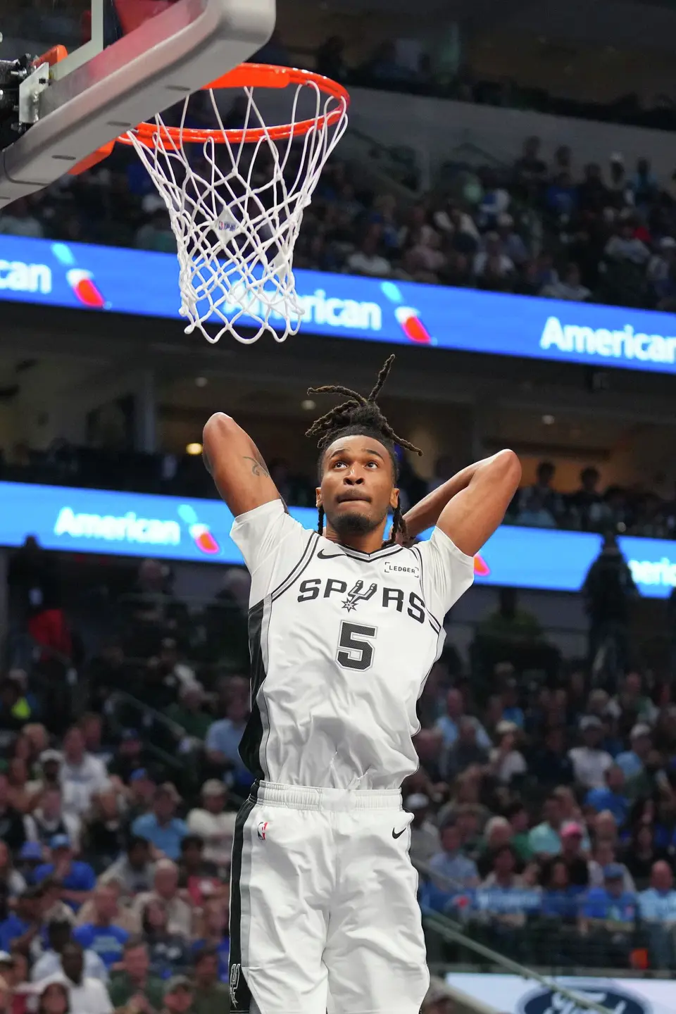 San Antonio Spurs guard Stephon Castle goes up for a basket against the Dallas Mavericks during the second half of an NBA basketball game Saturday, Oct. 24, 2026, in Dallas. (AP Photo/Julio Cortez)
