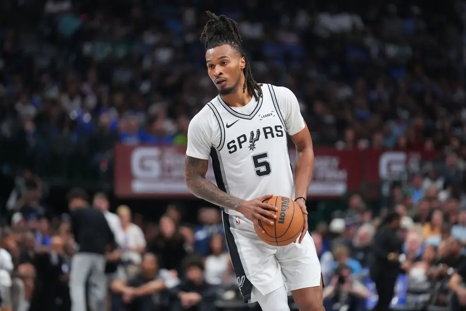 San Antonio Spurs guard Stephon Castle works the floor against the Dallas Mavericks during the second half of an NBA basketball game Saturday, Oct. 24, 2026, in Dallas. (AP Photo/Julio Cortez)