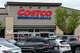Vehicles stand parked in rows near the entrance of a Costco Wholesale store in Utah on Sept. 27, 2026.