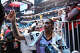 Gabby Williams of the Golden State Valkyries signs autographs as she leaves the court following her team’s victory against the Atlanta Dream in Game 4 of the 2026 WNBA Finals at State Farm Arena on Oct. 24, 2026, in Atlanta.