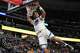 How a month of questions turned Warriors' Yaxel Lendeborg into a force 1 Warriors forward Yaxel Lendeborg hangs at the rim after dunk against the Nuggets in Denver on Monday.