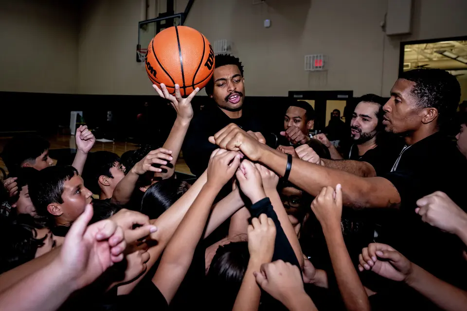 October 26, 2026, San Antonio, TX: San Antonio Spurs guard Keldon Johnson leads a huddle with cameras during a RBFCU Spurs Youth Basketball League clinic at CentroMed Health & Wellness Clinic in San Antonio, Texas Monday, October 26, 2026. (Photo by Reginald Thomas II/San Antonio Spurs)