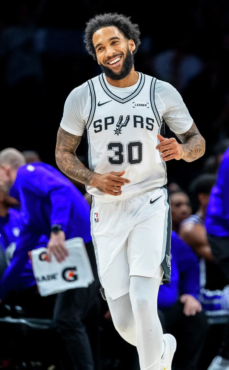 Spurs forward Julian Champagnie (30) reacts to his shot during the NBA game against the Sacramento Kings at Frost Bank Center in San Antonio, Texas, on Tuesday, Oct. 27, 2026.