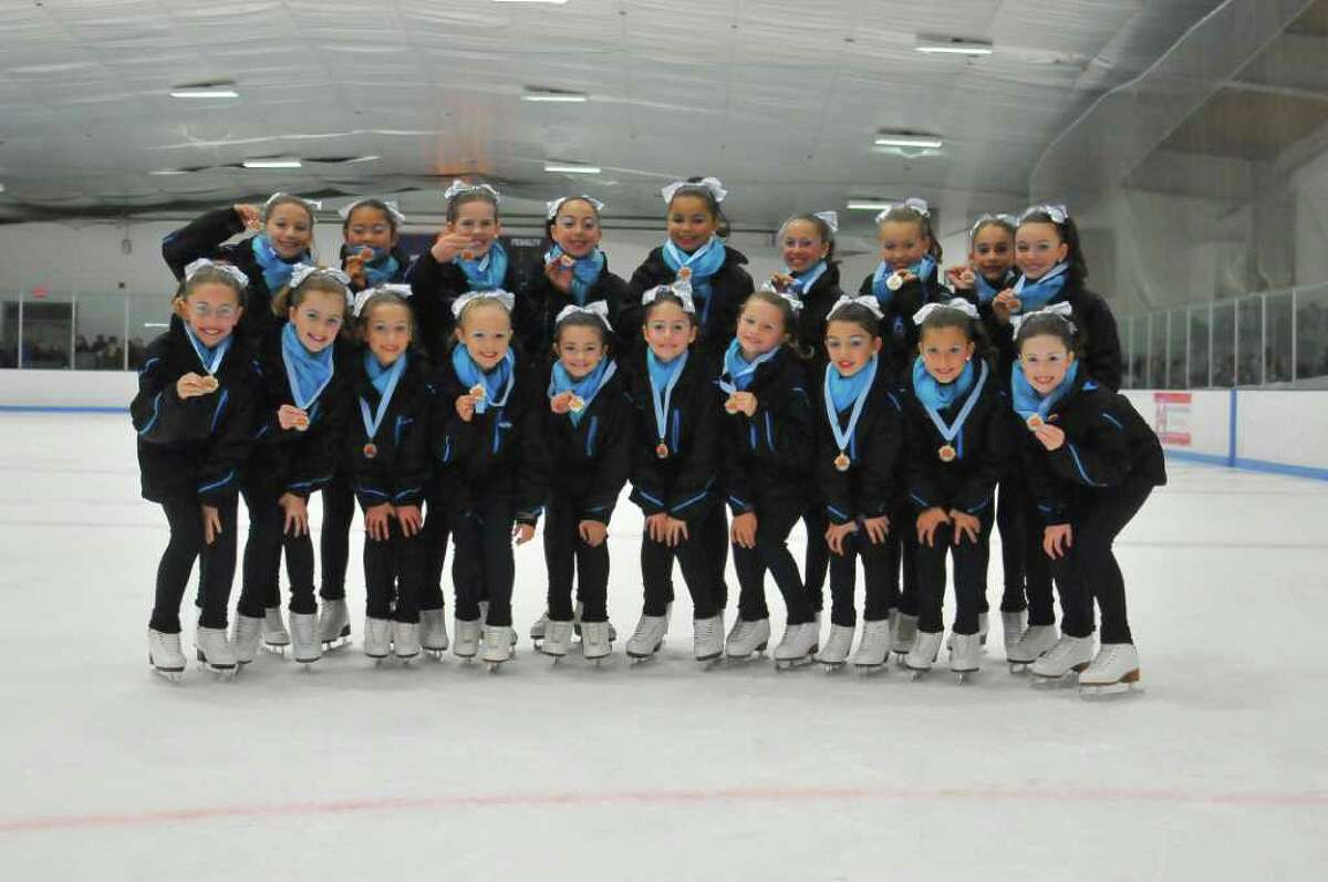 The Skyliners are made up of 135 synchronized skaters who skate at seven different levels, or lines. The preliminary team, pictured above, represents Windy Hill Skating Club in Greenwich.