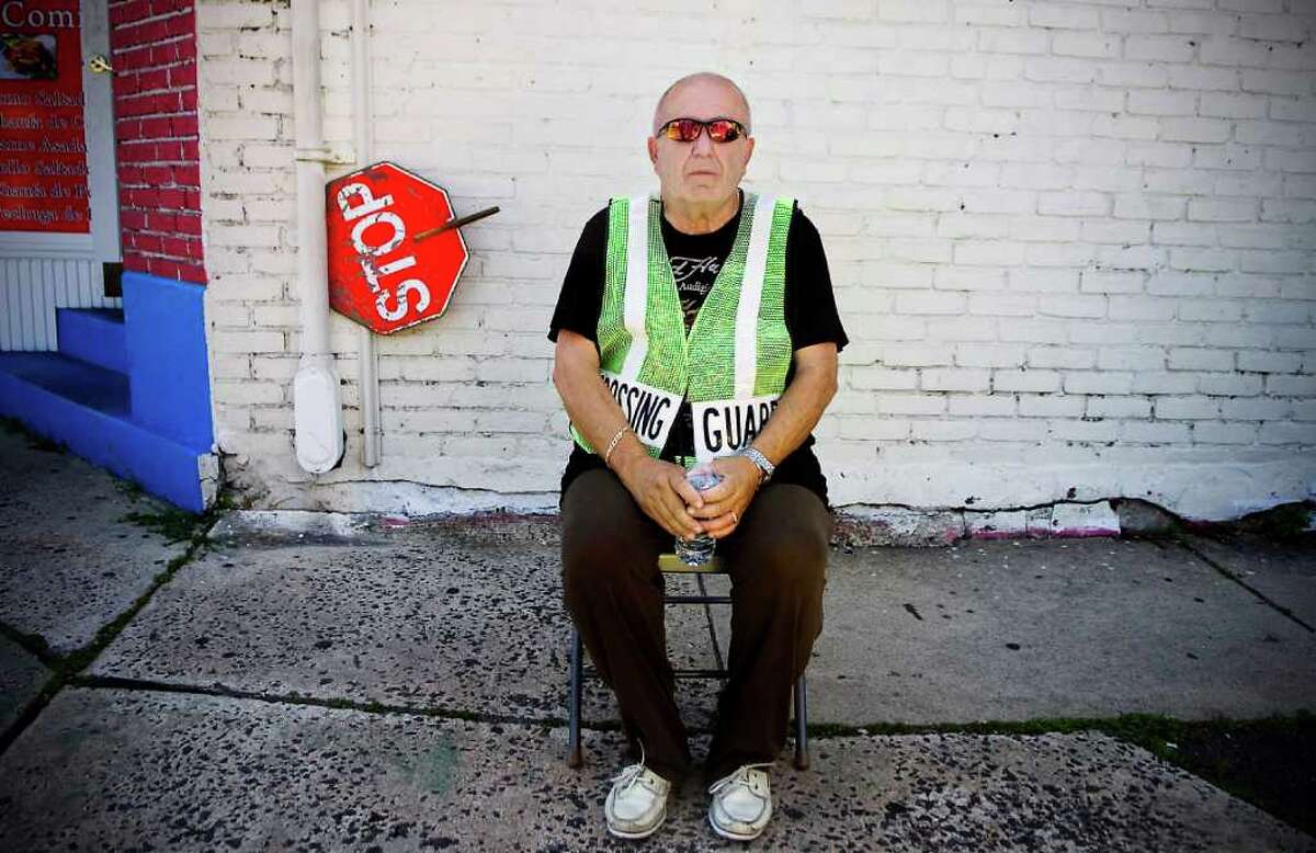 John Musolini, 67, a lifelong Stamford resident. Musolini is a retired Pitney Bowes manager and part-time crossing guard on Hope Street. “To me, the United States is the greatest country in the world. I served in the Army Reserve and in this country, even though we get in trouble, we all stick together. And guess what — we survive.” Kathleen O’Rourke/Staff Photographer