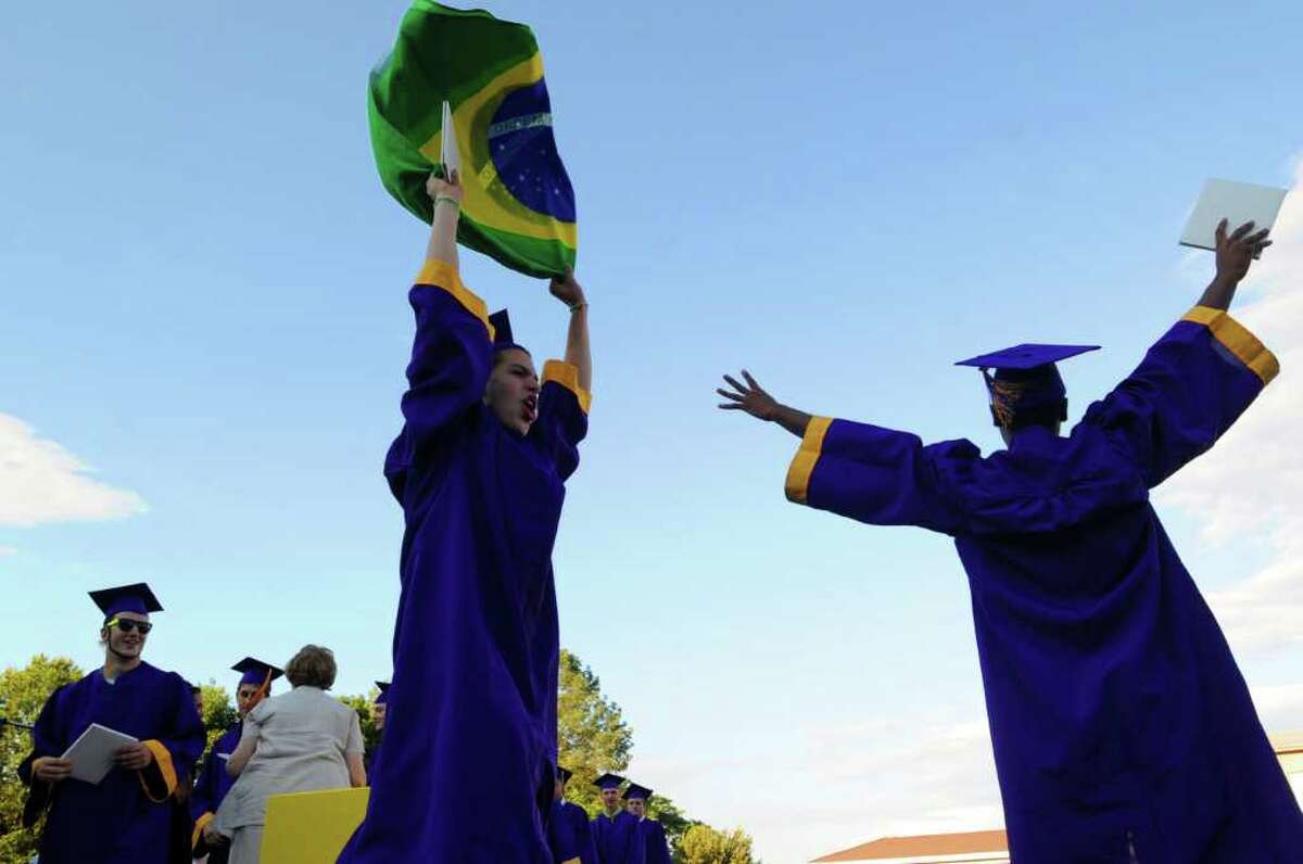 Diego Larrosa and Vincent Hope celebrate their graduation while demonstrating support for the Brazilian soccer team during Westhill High School Class of 2010 Commencement Thursday, June 24, 2010.