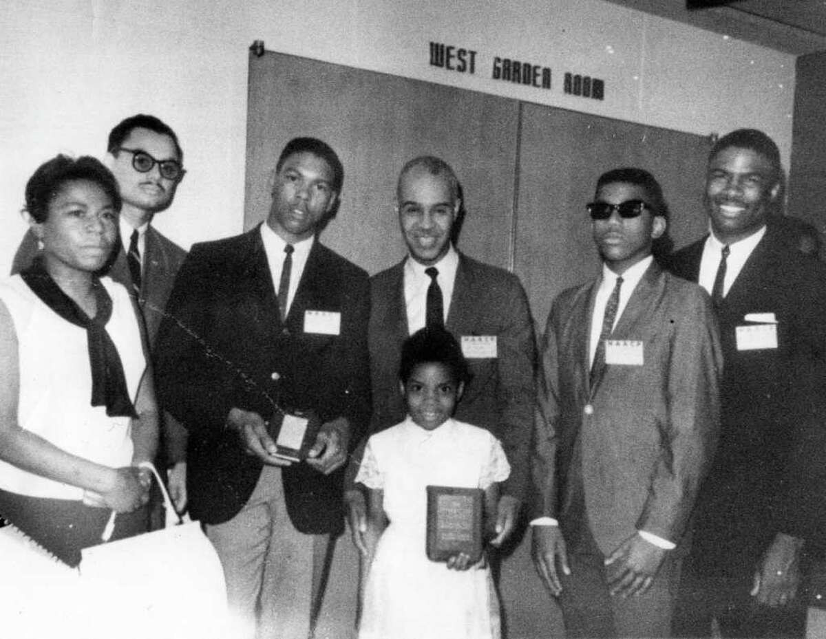 Roy Wilkins was taken in 1966 when Mrs. Tisdale received the awards referred to in her obituary. From left to right are: Loyse Tisdale, Joel Kent (Bpt. NAACP), William Chandler (Bpt. Youth Council President), the legendary Roy Wilkins (Executive Director, National NAACP), Preston Tisdale, James Tisdale...and the little girl in front is me, Maisa Tisdale!