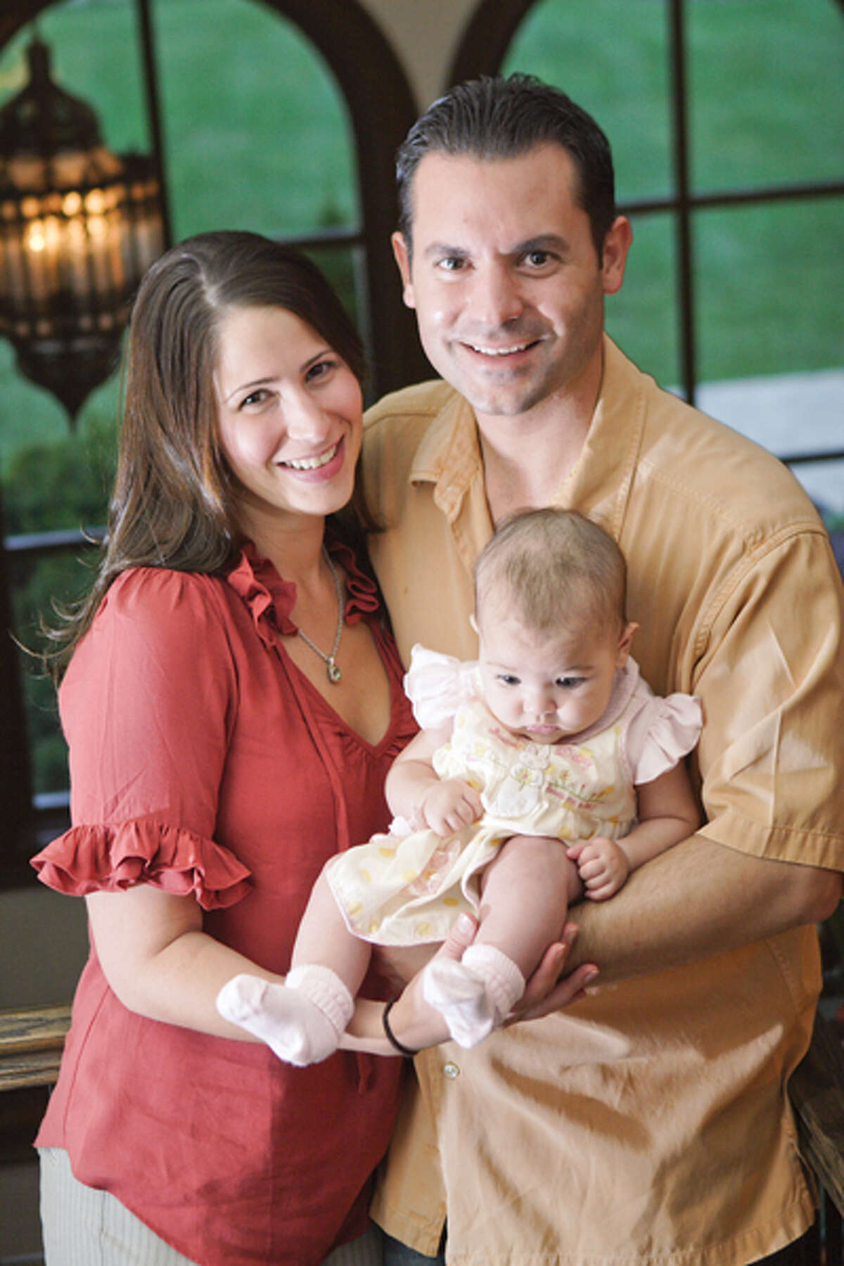 Chef Bobby Mallozzi is part of a Rotterdam-based family that oversees a veritable empire of eating establishments, including Villa Italia, the Brown Derby and the restaurant at Albany's Italian American Community Center. He and his wife Adrian became the parents of baby Stella in May 2009. (Suzanne Kawola/Life@Home) Click here to read the story.