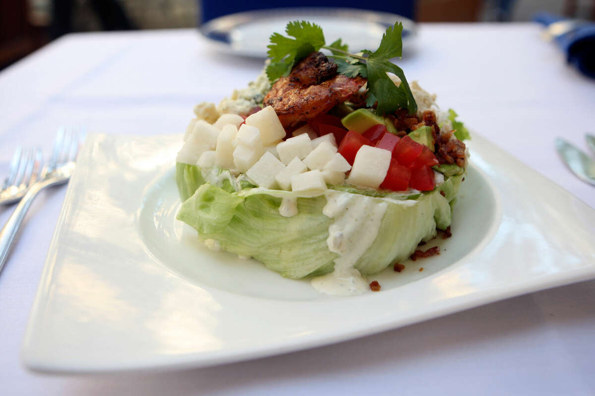 A Shrimp and Crab “Cobb” salad featured iceberg lettuce, crab, jicama, avocado and a barbecue-glazed shrimpHELEN L. MONTOYA/hmontoya@express-news.net